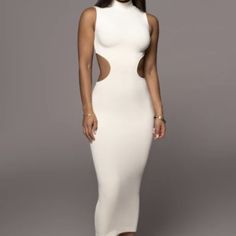 Brand New Forever Mesmerizing In Our Ivory Til Sunrise Midi Dress. This Beautiful Midi Dress Highlights A Mock Neckline With Sleeveless Shoulders And A Seductive Cutout At The Waist. Double Lined. Stretchy. Designed In Our New Gummi Fabric Delivering Premium Quality In A Creamy Soft Material Constructed With Sculpting Support And 4-Way Stretch Offering High Elasticity While Retaining Its Hold. Materials: 68% Polyester 26% Rayon 6% Spandex Length: (Full) 52 In. Product Origin: Imported Washing In White Sleeveless Bodycon Dress For Date Night, Chic Sleeveless White Bodycon Dress, White Sleeveless Maxi Dress For Night Out, Chic Beige Bodycon Maxi Dress, Chic White Sleeveless Midi Dress, Off White Sleeveless Evening Midi Dress, Sleeveless Cream Dresses For Date Night, Off White Sleeveless Midi Dress For Evening, Cream Sleeveless Dresses For Date Night