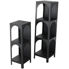 two black shelves sitting next to each other