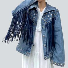 Fringe embellished color denim jacket online—excellent women's denim jacket from the 2023 Spring-Summer Collection. Every day. edgy style makes you feel more at ease. Yes. urban style can make you feel more at ease every day. You don't have to be a fashion expert to locate items complimenting your style and make you feel great. The purpose of urban-trend is to choose comfortable and stylish garments. It's all about developing looks that you enjoy and are proud of.Embellished denim is a timeless Tassel Jacket, Denim Coat Women, Oversized Jean Jacket, Urban Trends, Denim Jacket Fashion, Heavy Industry, Jean Jacket Women, Embellished Denim, Five Pointed Star