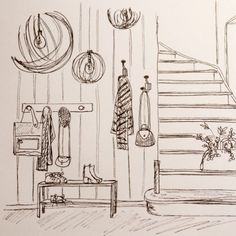 a drawing of a living room with stairs and clothes hanging on the wall next to a coffee table