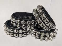 "2 Row Large 1/2\" Studs Full Grain Leather   Handcrafted Bracelet    select from 4 types of studs and colors     This a handcrafted leather 1 - 1/4\" wide Cuff/bracelet.  The Leather is nice and soft, it will get buttery and more subtle with wear.    The leather is available in vibrant colors.  Black Red  Pink White     The studs have a nice luster to them. These studs are plated in a nice nickel plating. The studs look like silver/Chrome This wristband/Bracelet is basically a one-size fits all Punk Outfits Polyvore, 80s Bracelets, Emo Bracelets, Goth Bracelets, Punk Bracelets, Types Of Bracelets, Usa Bracelet, Leather Types, Studded Bracelet