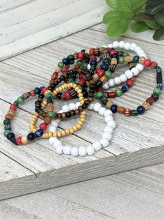 Pouge Life Bracelets, Pouge Life Bracelet Colors, How To Make An Obx Bracelet, Obx Inspired Jewellery, Kies Necklaces Outer Banks, Multiple Bracelets, Wood Bead Bracelet, Wood Bracelet, Planner Charms