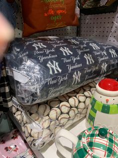 baseballs, mugs and other items are on display