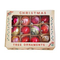 a christmas tree ornament box filled with ornaments