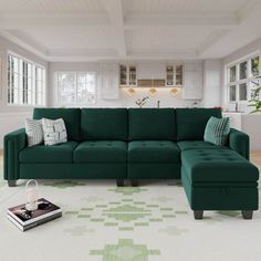 a living room with a green couch and ottoman