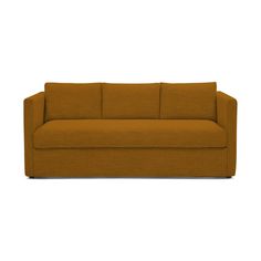 an orange couch sitting on top of a white floor