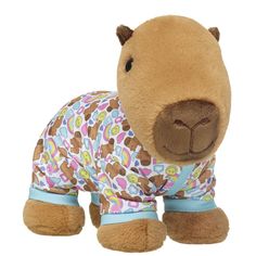 a stuffed animal is wearing a shirt