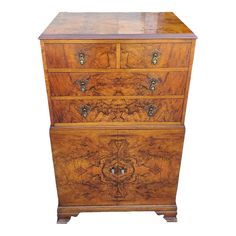 an old wooden chest with drawers on it