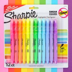 six different colored sharpie pens are in a package with the same color as each other