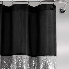 a black and white shower curtain with silver sequins