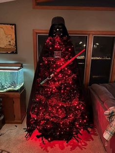 a darth vader christmas tree with red lights