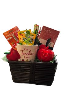 a teacher's day gift basket with apples, books, and snacks in it