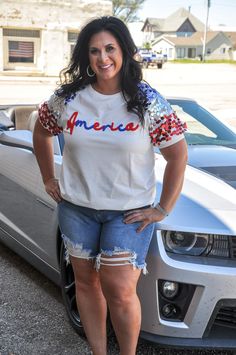 Introducing our America Letter Appliqué Spangle Puff Sleeves Top, a patriotic statement piece that exudes style and flair. Featuring dazzling spangle accents and bold letter appliqués, this top celebrates American spirit with a touch of sparkle. The puff sleeves add a playful and feminine touch, elevating the look with a hint of vintage charm. Whether you're attending a Fourth of July celebration or simply want to show off your love for the USA, this top is sure to turn heads wherever you go. Pair it with denim shorts for a casual daytime look or dress it up with trousers for a patriotic night out. Embrace your American pride in style with our America Letter Appliqué Spangle Puff Sleeves Top. Fourth Of July Celebration, Puff Sleeves Top, American Spirit, Sleeves Top, American Pride, Vintage Charms, Fourth Of July, Puff Sleeves, Puff Sleeve