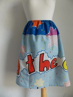 "cute edd the duck skirt handmade from vintage upcycled fabric with an elasticated waist. it measures; waist; approx from 26\" upto 40\" length; approx 20.5\"" Cute Blue Cotton Skirt, Playful Cotton Mini Skirt, Retro Cotton Mini Skirt, Playful Cotton Lined Skirt, Playful Blue Cotton Skirt, Retro Blue Cotton Skirt, Cute Multicolor Cotton Skirt, Multicolor Cotton Skirt With Elastic Waistband, Playful Multicolor Skirt With Elastic Waistband