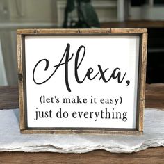 a sign that says, alexa let's make it easy just do everything