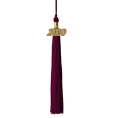 a purple tassel with gold leaf decoration