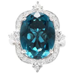 12.75 Carats Natural Impressive London Blue Topaz and Diamond 14K White Gold Ring Total Natural London Blue Topaz Weight: Approx. 12.00 Carats London Blue Topaz Measures: Approx. 15 x 11mm Natural Round Diamonds Weight: .75 Carats (color G-H / Clarity SI1-SI2) Ring size: 7 (we offer free re-sizing upon request) Ring total weight: 9.0 grams SKU #557 Emerald Cut Rings, London Blue Topaz Ring, Gold Cocktail Ring, Etsy Gold Ring, Rings Diamond, Pink Topaz, Star Jewelry, 14k White Gold Ring, White Gold Ring