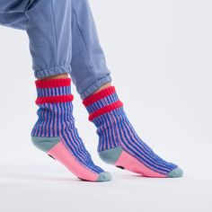 These unisex fleece-lined knit slipper socks are the best of both worlds! The easy fit of socks meets the plush comfort of house slippers. Our sporty striped House Socks are meant to mix and match—and keep you cozy indoors. Fully lined with fluffy faux fleece. Non-slip patches on sole. Washable. Sizes S/M (Womens 6-9, Mens 5-7.5)L/XL (Womens 9.5-12.5, Mens 8-11) Details Body – 100% Soft AcrylicLining - Polyester FleeceMachine wash cold gentle cycle, dry flat. Knit Slipper Socks, Gym House, House Socks, Childrens Shop, Tv Gift, Cinch Bag, Fall Bags, Knitted Slippers, Dog Sweaters