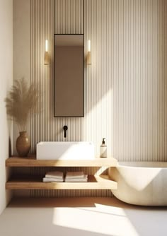 a bathroom with a sink, mirror and bathtub in the middle of the room