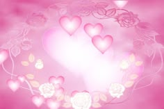 a pink background with hearts and roses in the shape of a heart on it's side