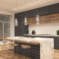 a modern kitchen with marble counter tops and bar stools