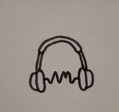 a drawing of headphones with the letter m in it's middle, on a gray background