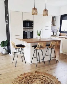 the kitchen is clean and ready to be used as a dining room or living area