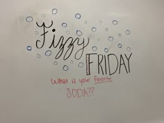 a white refrigerator with writing on it that says friday what is your favorite soda?