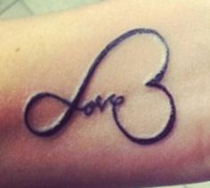 a tattoo with the word love drawn on it