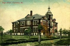 an old photo of a large brick building