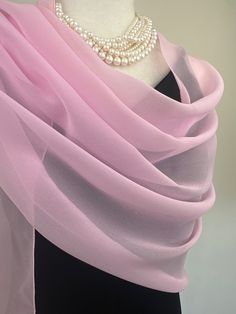 Elevate your style with our exquisite collection of chiffon shawls. Our chiffon shawls are the epitome of elegance and versatility, designed to effortlessly enhance your wardrobe and leave a lasting impression. Made from the fine poly chiffon fabric, these shawls offer a delicate and airy drape that adds a touch of grace to any outfit. Whether you're attending a special occasion, a casual gathering, or simply want to elevate your everyday look, our chiffon shawls are the perfect accessory. Choos Elegant Pink Dupatta, Elegant Pink Dupatta For Wedding, Elegant Pink Wedding Dupatta, Elegant Pink Scarf For Formal Occasions, Elegant Sheer Organza Veil, Elegant Pink Formal Scarves, Elegant Formal Pink Scarves, Elegant Sheer Dupatta Shawl, Elegant Pink Silk Scarf For Formal Occasions