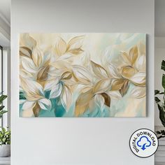 a painting hanging on the wall next to a potted plant