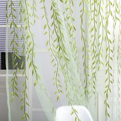 curtains with green leaves hanging from them and the words ebay on it in blue, pink