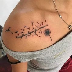 a woman's shoulder with a dandelion tattoo on her left arm and the words, everything happens