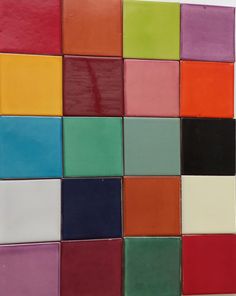 multicolored tiles are arranged in rows