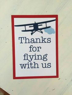 a sign that says thanks for flying with us