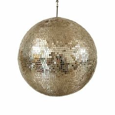 a shiny disco ball hanging from a chain