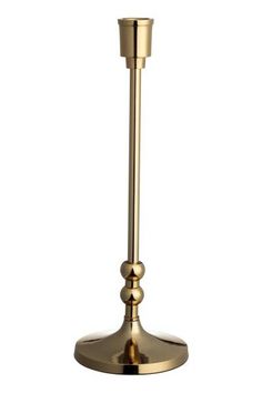 a gold candle holder on a white background