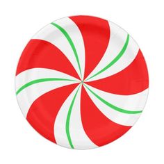 a paper plate with a red and green candy cane design on the front, against a white background