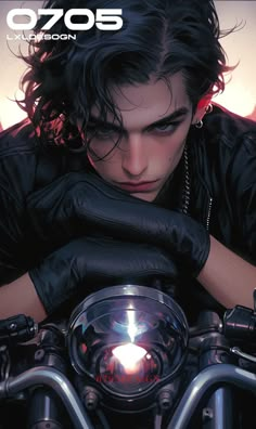 a man with long hair and black gloves on top of a motorcycle