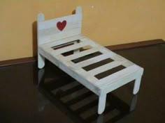 a chair made out of wood with a heart on it