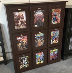 a bunch of comics are on display in a room