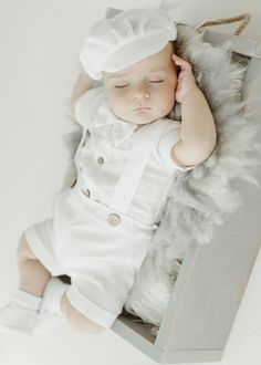 NEW! Here is a set that every parent will love ❤️  It must be a perfect day 🕊️✝️ Baby boy white linen suit  Made of the highest quality material. With attention to every detail ----------- Standard Outfit ( linen shirt- body, linen pants, linen bow tie ) ------   * linen shirt-body. Beautiful, white, classic. Short sleeve. Fastened with wooden buttons. Extremely soft and delicate * linen white shorts with suspenders  Our bestseller and must have this season spring-summer 2024 Finished and decorated with distinctive coconut buttons. Extremely comfortable, soft. Comfort and convenience. Braces, adjustable elastic band. Two cute pockets. * 100% linen bow tie (white or beige)  (please specify in the personalization window) * 100% linen hat * 100% linen shoes (moccasins or sneakers ) (please s White Linen Summer Sets, White Linen Sets For Spring, Classic Cream Summer Sets, White Sets For Baptism In Spring, Classic White Sets For Summer, White Baptism Sets For Summer, White Summer Baptism Sets, Classic White Linen Set, Cream Sets For Baptism In Summer