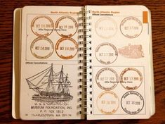 an open notebook with stamps on it