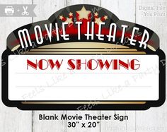 a sign that says taylor theater now showing name of movie that will be shown at 2nd line of text