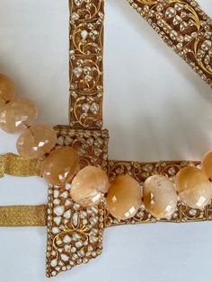 Half round citrine faceted beads (770 cts). The color of the beads is various apricot shades. The necklace has a handmade knot tie at the back and the beads are knotted individually which highlights the color. The necklace is 19 inches in total length. The beads are slightly graduated in size with smaller stones at the back moving to larger stones at the front. The largest beads at the front are approx 12mm x 15mm. A few of the stones have some flaws but the faceted cut provides a nice shine to Knot Tie, Handmade Envelopes, Faceted Bead, Apricot, Citrine, Necklace Etsy, Knot, Gold Bracelet, Highlights