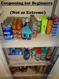 the bottom shelf of a refrigerator is filled with bottles and other household goods, including shampoos