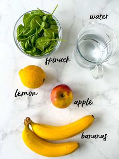 the ingredients to make an apple and banana smoothie laid out on a marble counter top