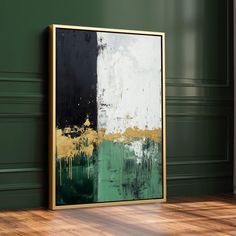 an abstract painting hangs on the wall next to a wooden floor in a green room