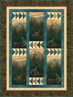 a quilt with an image of horses and mountains in the background, on top of a blue